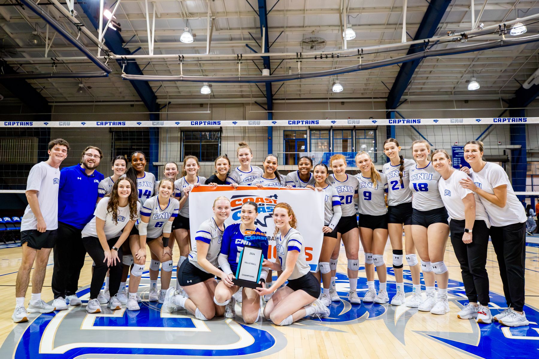 Captains Volleyball Homepage Photo - Team holding trophy up